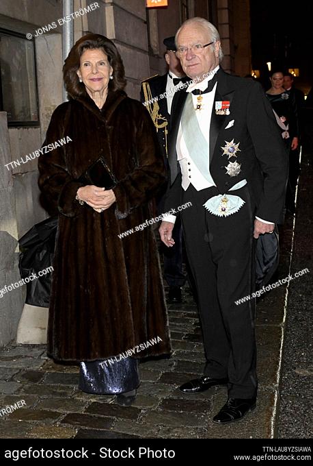King Carl Gustaf and Queen Silvia arrive at the Swedish Academy's annual festive gathering in the Great Stock Exchange Hall in the Börshuset in Stockholm