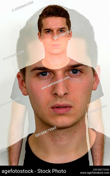 Studio shot of young handsome man against white background