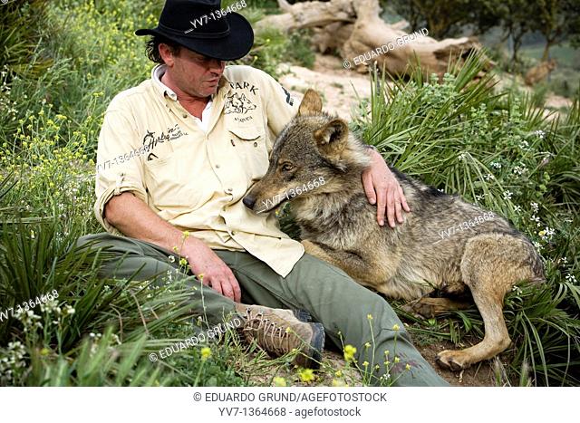 Daniel Weigend, with one of its Iberian wolves, Wolf park, Antequera, Malaga, Andalusia, Spain