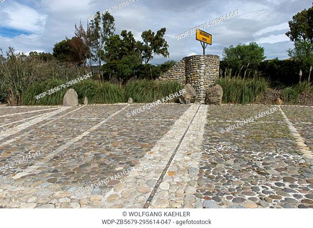 The Equator Line at the Quitsato equator monument and sundial near Cayambe in the highlands of Ecuador near Quito