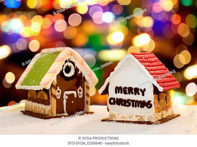 gingerbread houses over christmas lights