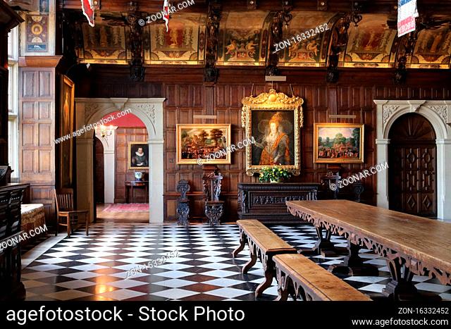 27 August 2017 - Hatfield, UK: Hatfield House dining hall with tiled floor. High quality photo