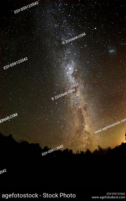 Starry sky in the Southern hemisphere small and large Magellanic Clouds visible