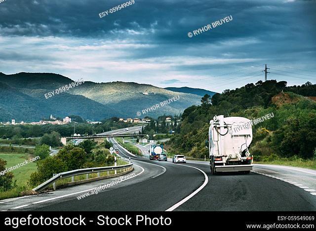 Special Concrete Transport Truck In-transit Mixer Unit In Motion On Country Road, Freeway. Freeway Motorway Highway. Business Drive Transportation And...