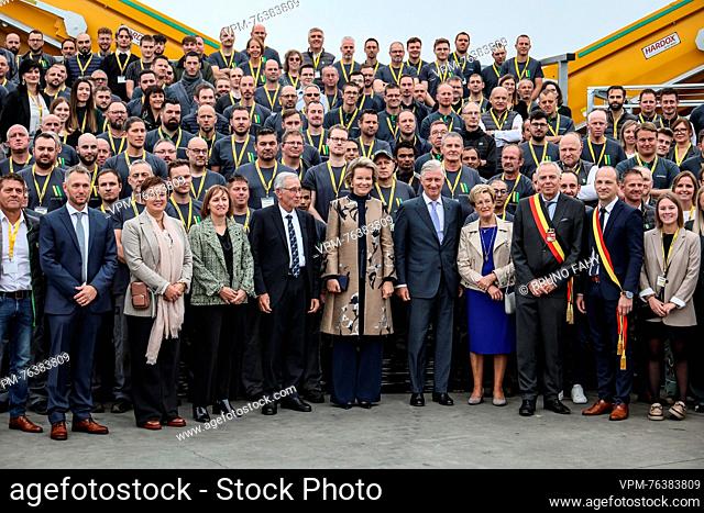 King Philippe - Filip of Belgium and Queen Mathilde of Belgium pose for a family portrait during a visit to Joskin in Soumagne