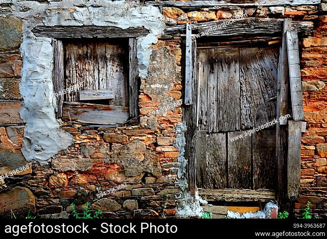 Rustic wood doors in Church street of Corgomo, Vilamartin de Valdeorras, Ourense, Spain