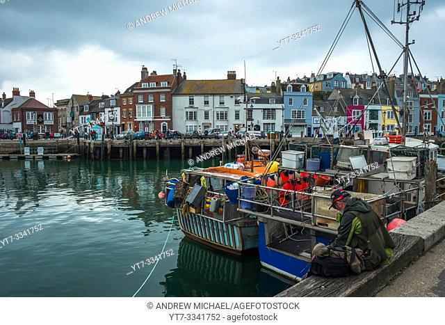Weymouth Harbour (or the Old Harbour) a picturesque harbour with 17th-century waterfront at seaside town Weymouth in Dorset, southern England. UK