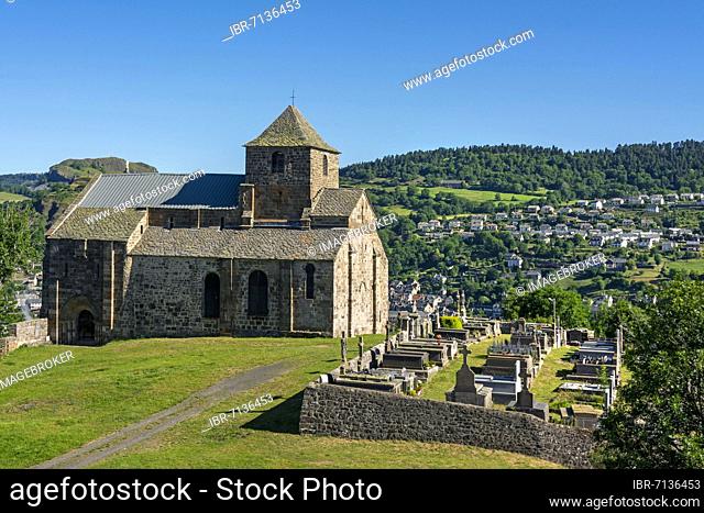 Albepierre Bredons, romanesque church Saint-Pierre de Bredons overlooking the city of Murat, Cantal department, Auvergne-Rhone-Alpes, France, Europe