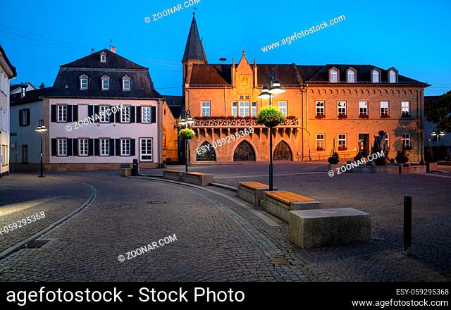 Panoramic image of the market square of Bad Sobernheim with townhall and old pharmacy at blue hour, Germany