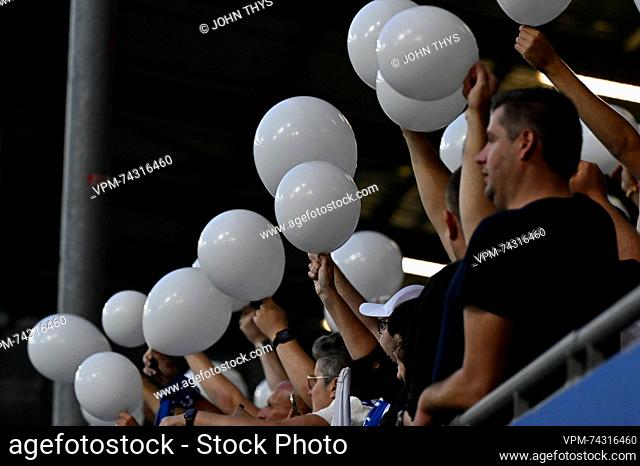 Illustration shows supporters with white balloons in tribute for young Gent's supporter Leonard (17) who was killed after being hit by a car while he was riding...