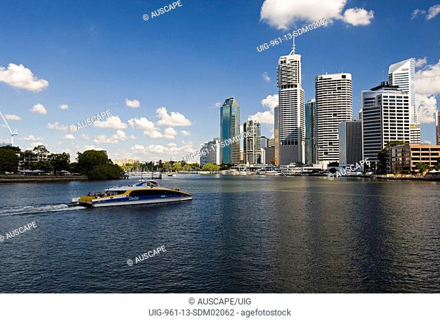 City skyline and a launch on the Brisbane River, Brisbane, Queensland, Australia