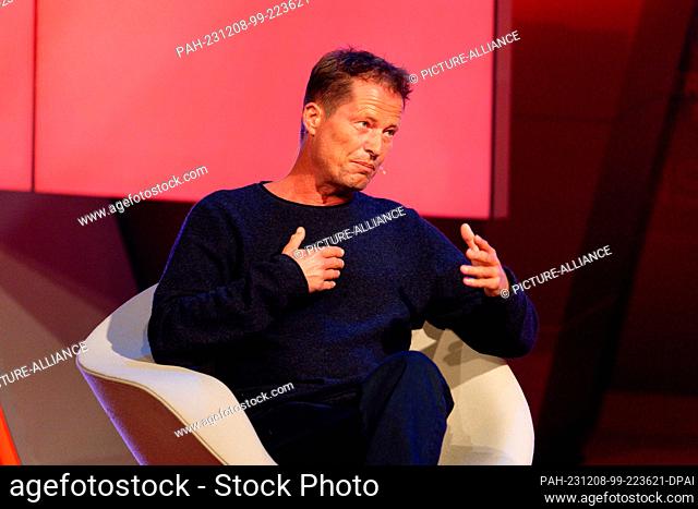 07 December 2023, North Rhine-Westphalia, Hürth: Actor Til Schweiger sits in the RTL annual review ""2023! People, Images, Emotions"" in the studio