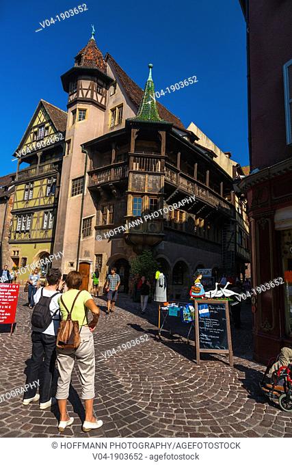 Tourists in front of the 16th century Maison Pfister in Colmar, Alsace, France, Europe