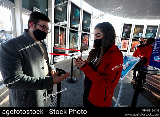 Illustration picture shows security scanning Covid Safe Tickets CST in the entry hall of a Kinepolis cinema complex in Brussels, Saturday 01 January 2022