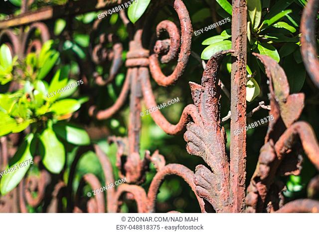 old rusted fence - rusty railing, wrought metal balustrade