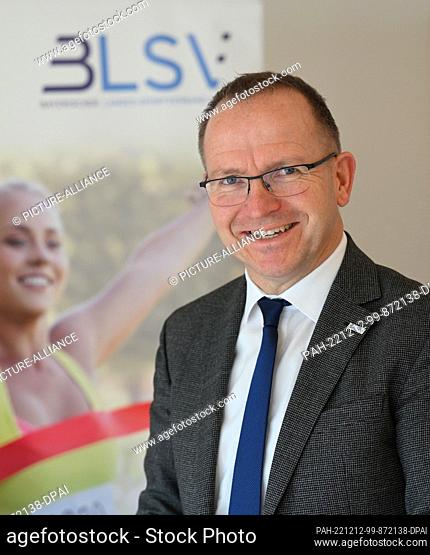 12 December 2022, Bavaria, Munich: The President of the Bayerischer Landes-Sportverband e.V. (BLSV), Jörg Ammon looks into the camera after a media round on the...