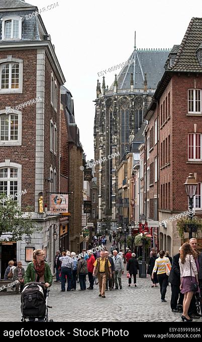 GERMANY, AACHEN - SEPT 29; 2014: People shopping in the streets of Aachen, Aachen is famous because of the dom church next to this terrace