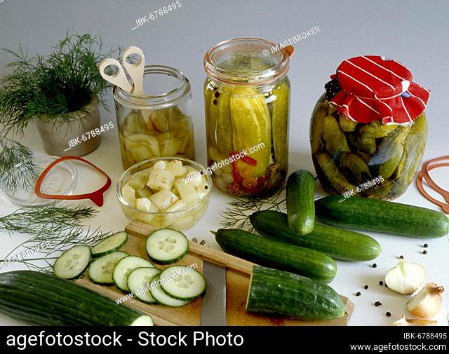 Preserved mustard gherkins and pickled cucumbers Still life