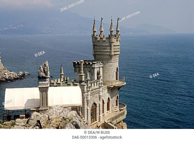 Ukraine - Crimea - Alupka, surroundings of Yalta - Cape Ai-Todor, on the Black Sea. Lastochkino gnezdo (Swallow's nest) built between 1911-1912 on the top of...