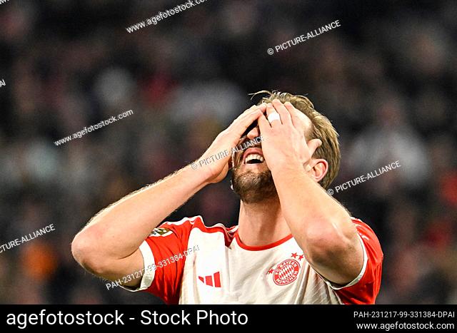 17 December 2023, Bavaria, Munich: Soccer: Bundesliga, Bayern Munich - VfB Stuttgart, Matchday 15, Allianz Arena. Munich's Harry Kane holds his hands in front...