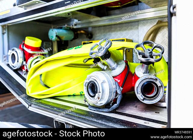 Fire hoses and connections in truck of fire brigade
