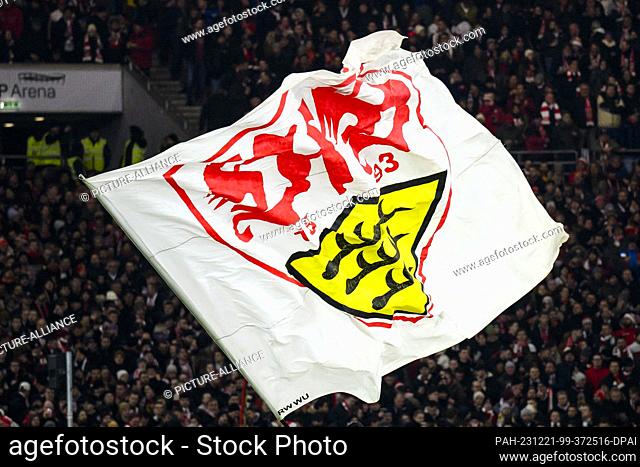 20 December 2023, Baden-Württemberg, Stuttgart: Soccer: Bundesliga, VfB Stuttgart - FC Augsburg, Matchday 16, MHPArena. A VfB Stuttgart flag is waved Photo: Tom...
