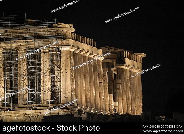 30 September 2020, Greece, Athen: The Acropolis shines in a new light: a new lighting system has been inaugurated by the Ministry of Culture at the...