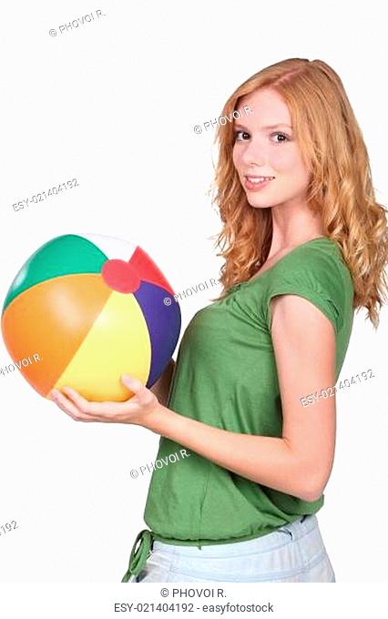 Teenage girl with beach ball
