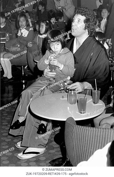Feb. 22, 1973 - Tokyo, Japan - Singer TOM JONES wears a formal Japanese kimono at a tea party for 30 orphans of the Salvation Army's Institute in his suite at...