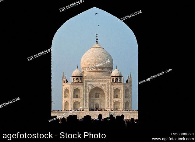 AGRA, INDIA - 23 OCTOBER 2013 : The Taj Mahal, mausoleum built by Mughal emperor Shah Jahan in memory of his third wife, Mumtaz Mahal