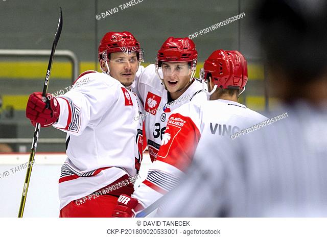 From left hockey players OSKARS CIBULSKIS, TOMAS VINCOUR, LUKAS VOPELKA of Mountfield Hradec celebrate a goal during the Ice hockey Champions League matches...