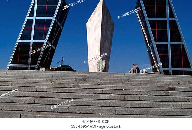 Low angle view of a monument between two towers, Puerta de Europa Kio Towers, Madrid, Spain