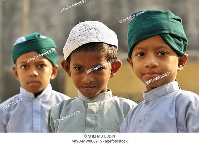 Portrait of Muslim children during the Eid-ul-Adha festival Mayshaghuni, Rupsha, Khulna, Bangladesh January 01, 2007 Eid-ul-Adha is one of the two main Muslim...