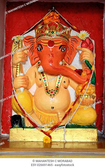 Idol of Ganesha decorated with painting at City Palace, Udaipur, Rajasthan, India, Asia