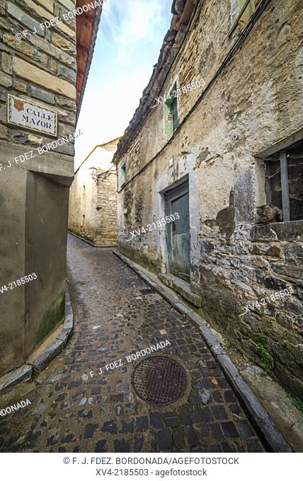 Stone architecture of houses and narrow streets in Aragues del Puerto village, Huesca Pyrenees, Aragón, Spain