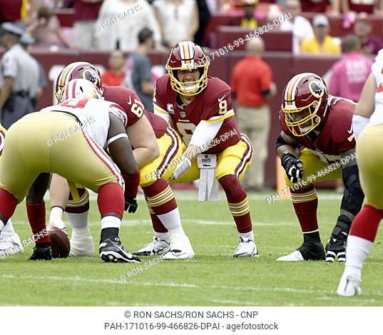 Washington Redskins quarterback Kirk Cousins (8) calls signals in first quarter action against the San Francisco 49ers at FedEx Field in Landover