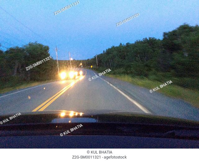 Bright headlights in bad weather, Halifax, Nova Scotia, Canada