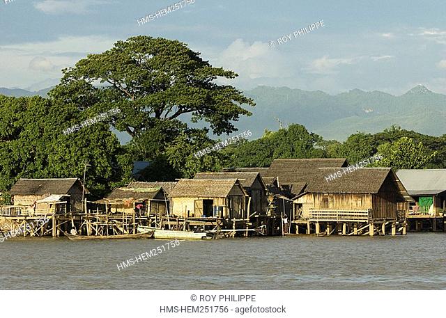 Myanmar Burma, Mandalay Division, village of bamboo houses at the edge of Irrawaddy River during the monsoon and the flood of the river