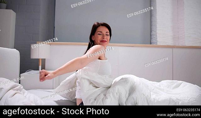 Woman Waking Up. Whole Body Wakeup And Stretching