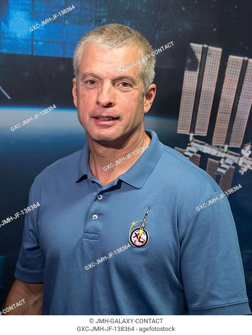 NASA astronaut Steve Swanson, Expedition 39 flight engineer and Expedition 40 commander, poses for a portrait following an Expedition 3940 preflight press...