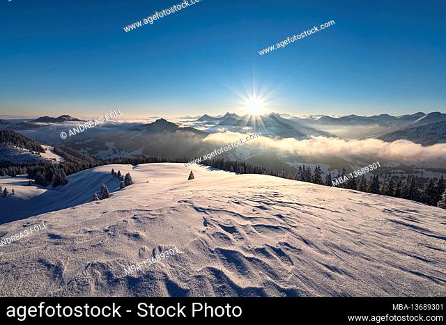 Alpine mountain landscape at sunrise on a cold winter morning. View from Wertacher Hörnle to the Allgäu Alps. Bavaria, Germany, Europe