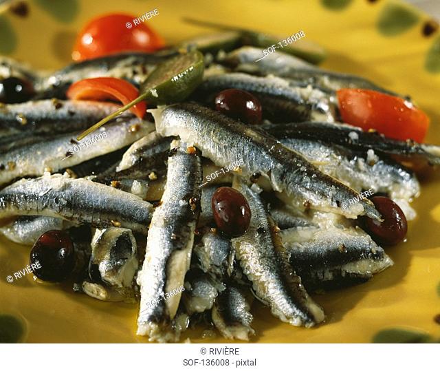 Anchovies with black olives and capers