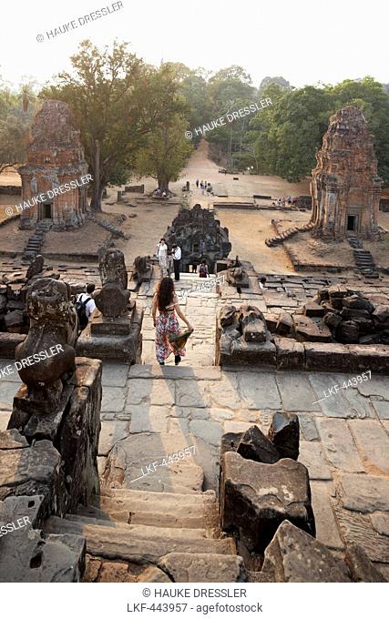 Visitors at the Bakong Temple mountain in the evening, Roluos, Siem Reap, Cambodia