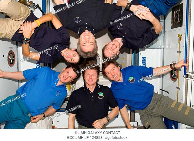 Expedition 20 crew members pose for an in-flight crew photo in the Harmony node of the International Space Station. Pictured clockwise are Russian cosmonaut...