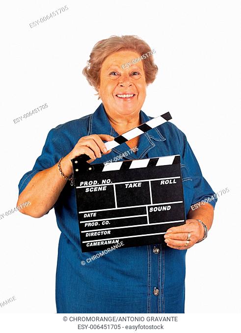 Elderly woman with clapper board on white background