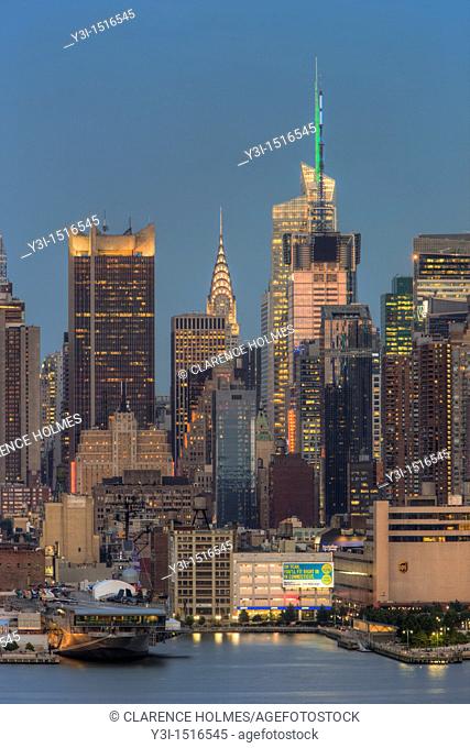 The skyline of Manhattan, New York City, USA at twilight as viewed over the Hudson River from New Jersey