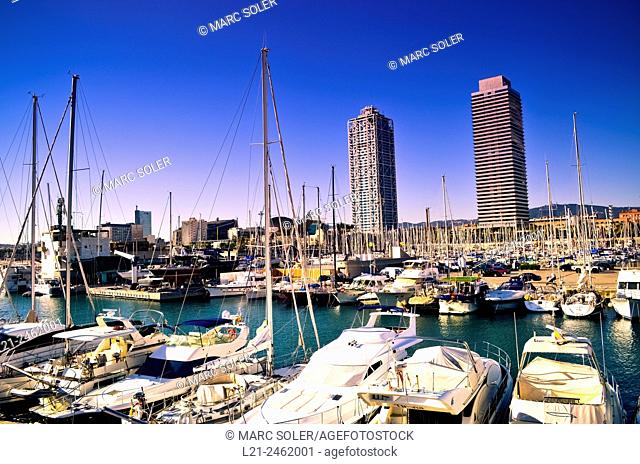Yachts at Olympic port. Mapfre tower and Hotel Arts near Olympic harbour. Olympic Village, Barcelona, Catalonia, Spain