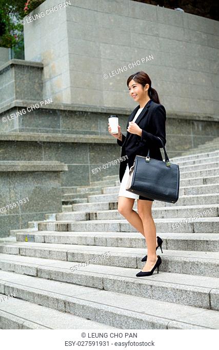 Businesswoman leaving office