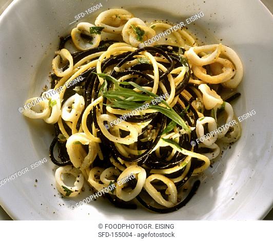 Black and white spaghetti with herb oil and squid (1)