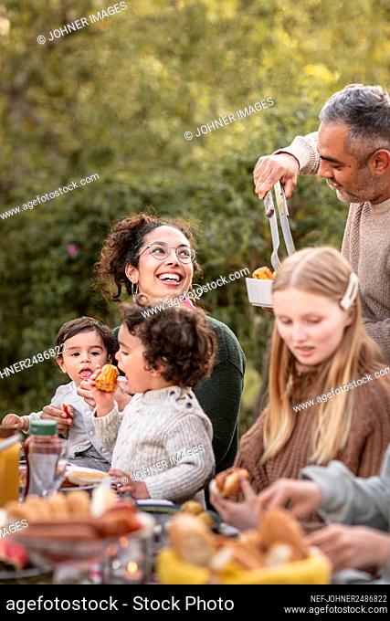 Family having meal in garden